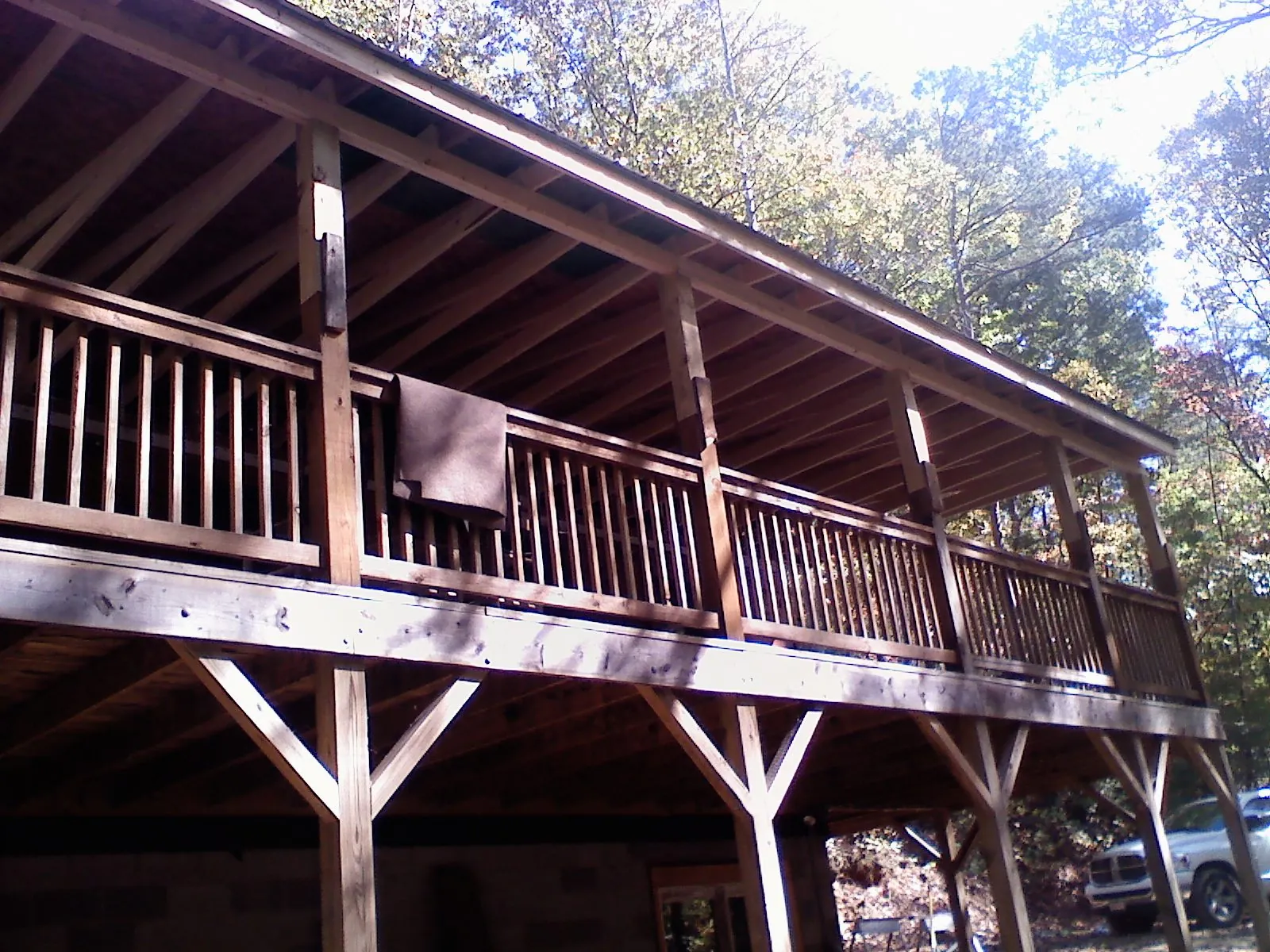 Timber framing under a new elevated porch and deck — Roof Leak Repair in Iron City by Roofing Brothers